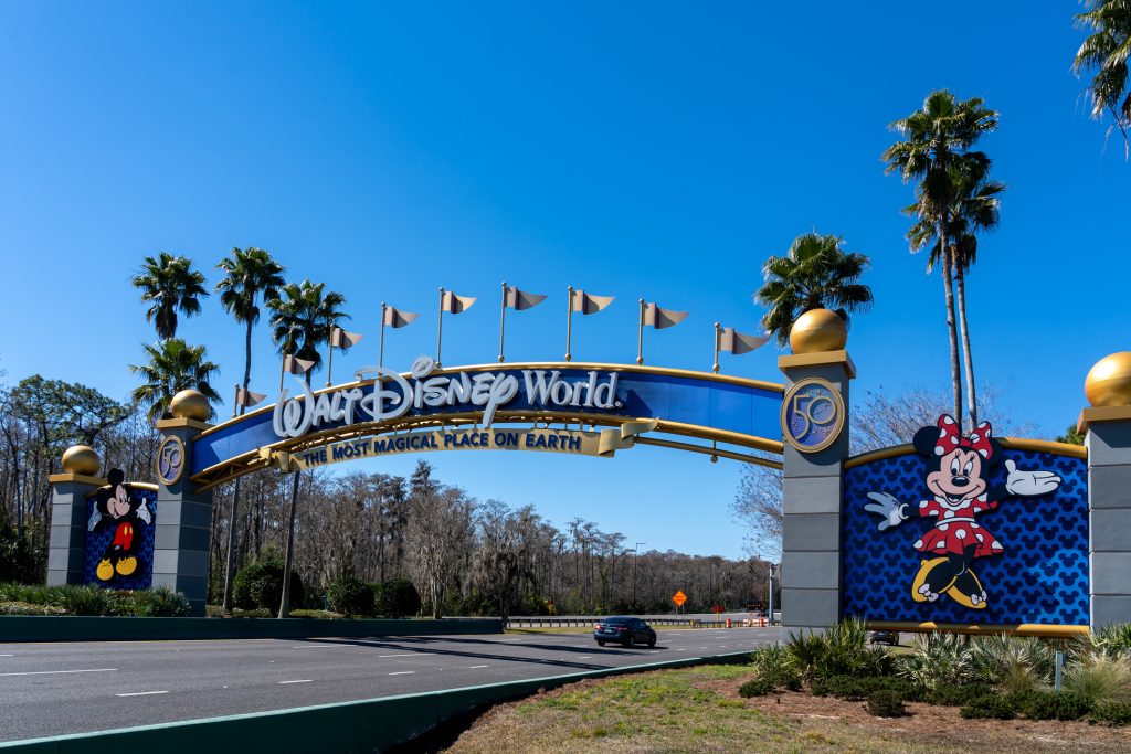 Orlando, Florida, USA - February 9, 2022: A Walt Disney World entrance arch gate in Orlando, Florida, USA. Walt Disney World is an entertainment resort complex.